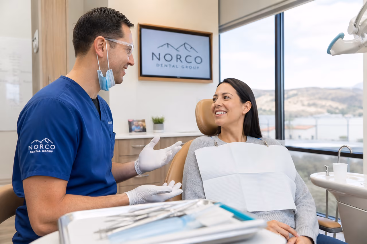 Dentist Examining a Patient in a Modern Dental Clinic