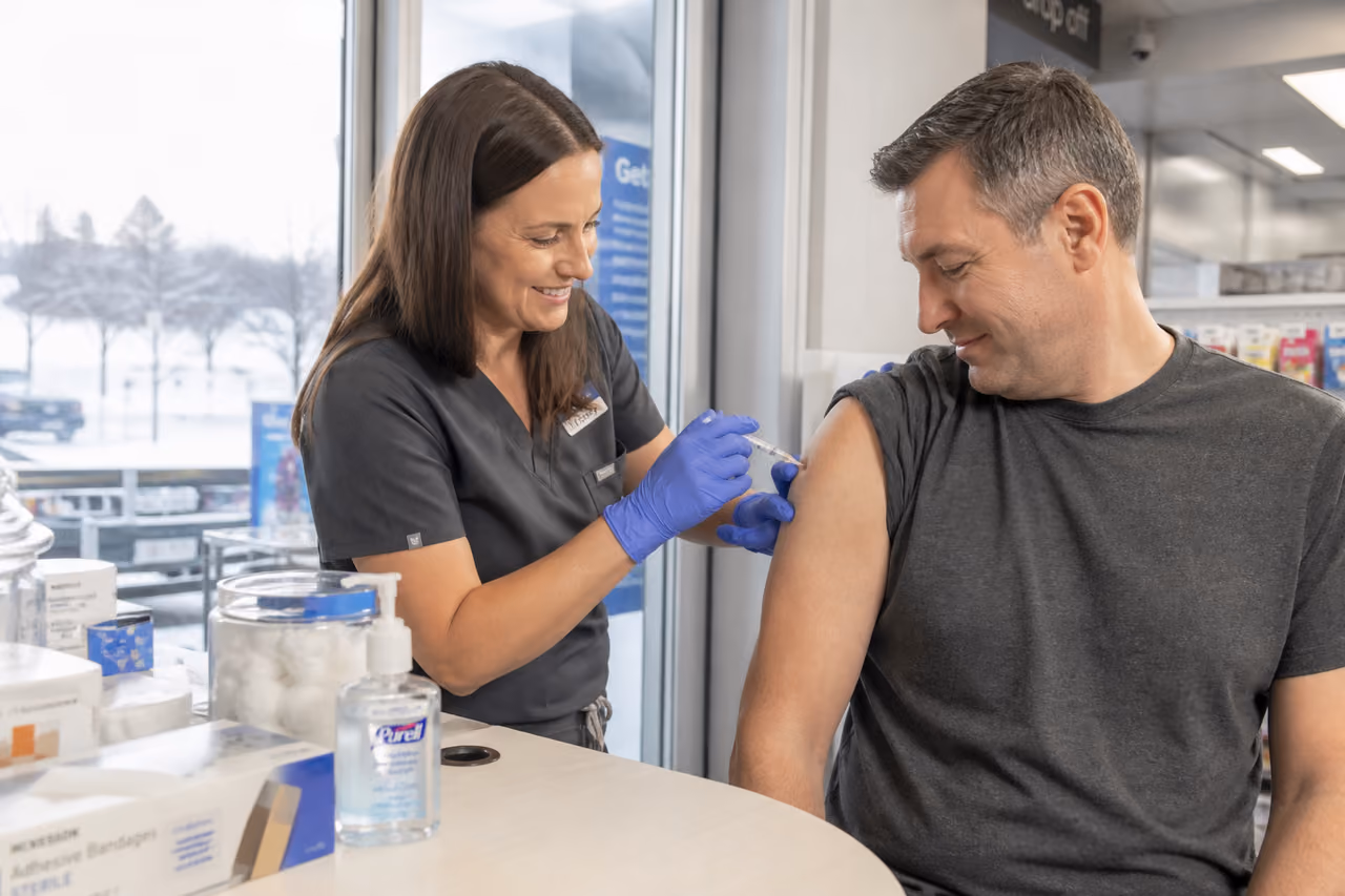 Patient Receiving Flu Vaccine at Clinic During Ontario Winter
