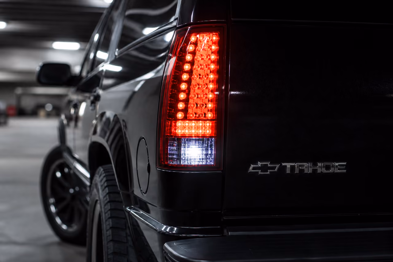Modern LED Tail Lights Installed on a Black 1998 Tahoe