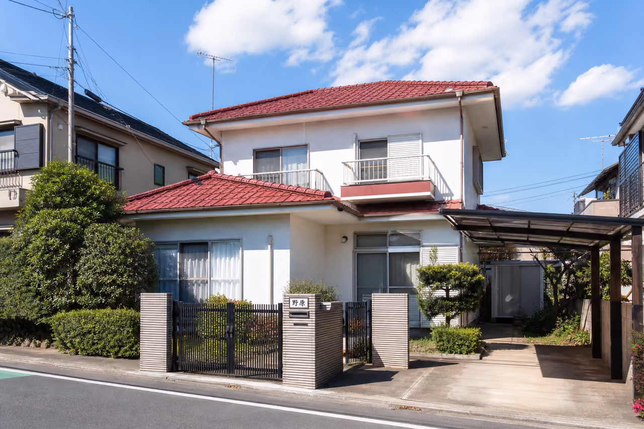 Traditional Japanese Suburban Home with Red Tiled Roof